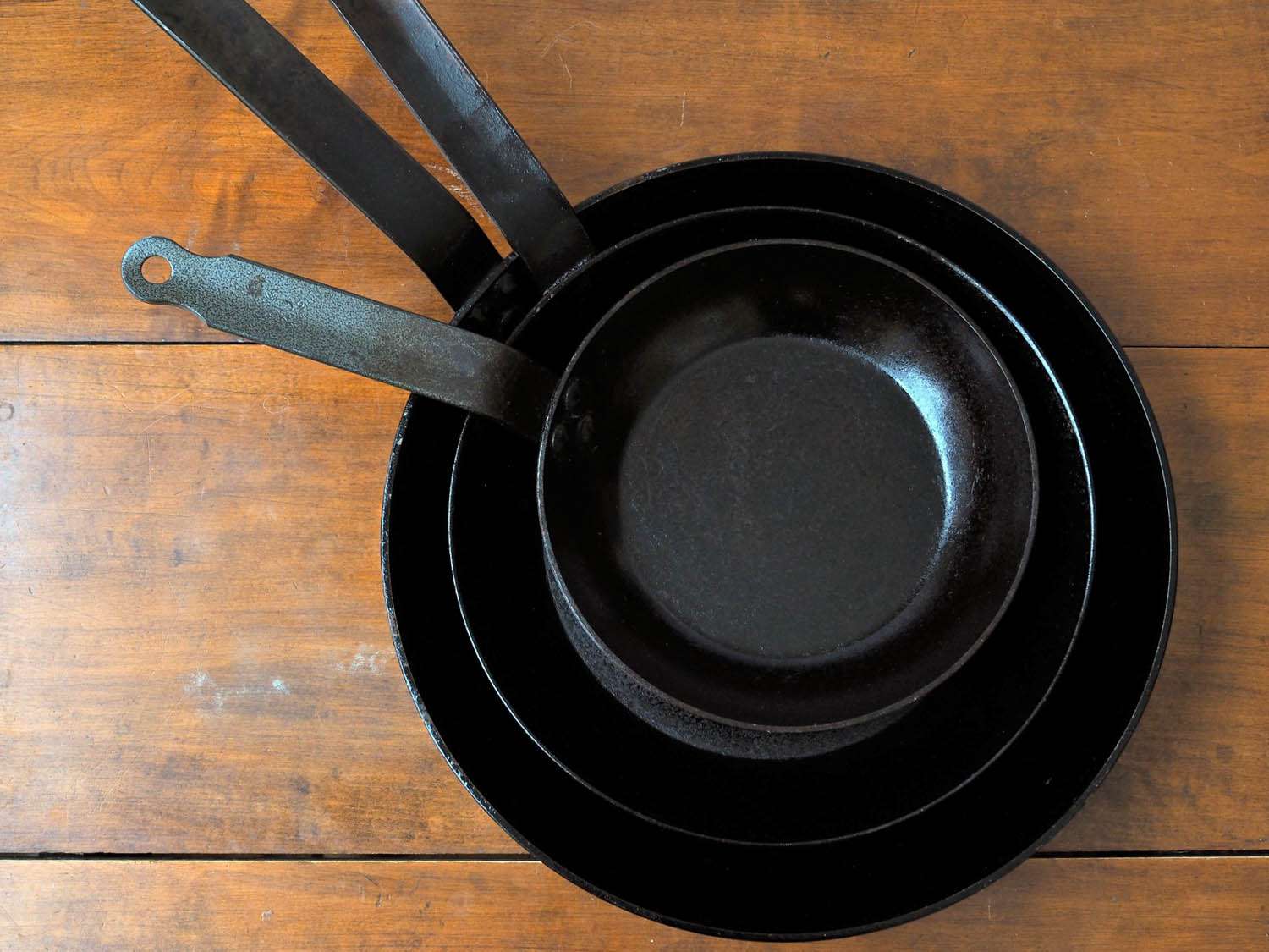 Stack of black steel plans