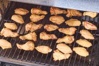 Chicken wings are cooked in the Traeger Woodridge Pro