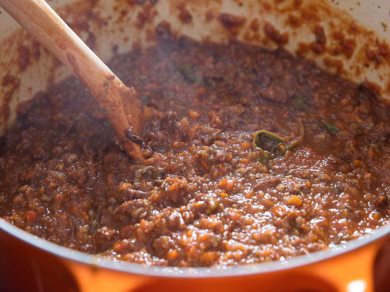 A Dutch oven containing vegan ragu with mushroom and seitan. 