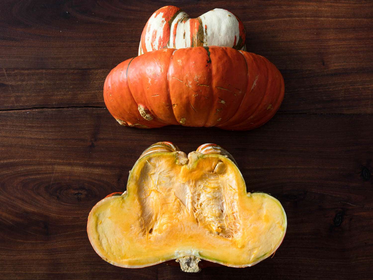 Turban squash halved and displayed cut side down and cut side up