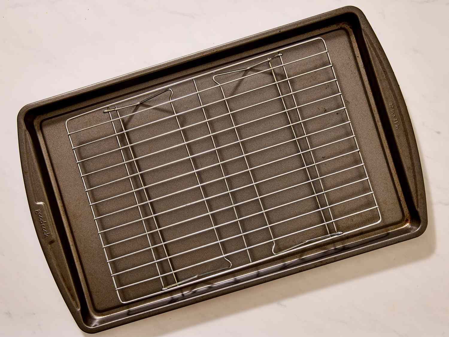 wire rack in a rimmed baking sheet 