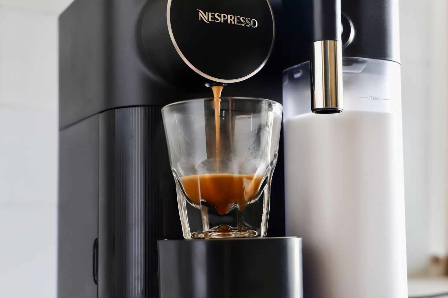 Espresso being dispensed into a cup by the Nespresso Gran Lattissima Original Espresso Machine by De’Longhi
