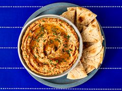 Overhead view of burnt eggplant and roasted red pepper dip 