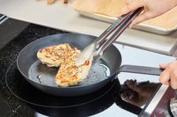 Chicken is cooked in the Merten & Storck Pre-Seasoned 10-inch Carbon Steel Frying Pan
