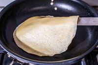 A crepe cooking in the Cuisinart 622-24 Chef’s Classic Nonstick Skillet