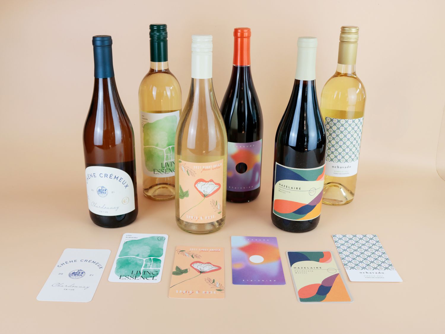 bright cellar wines with info cards on taupe surface