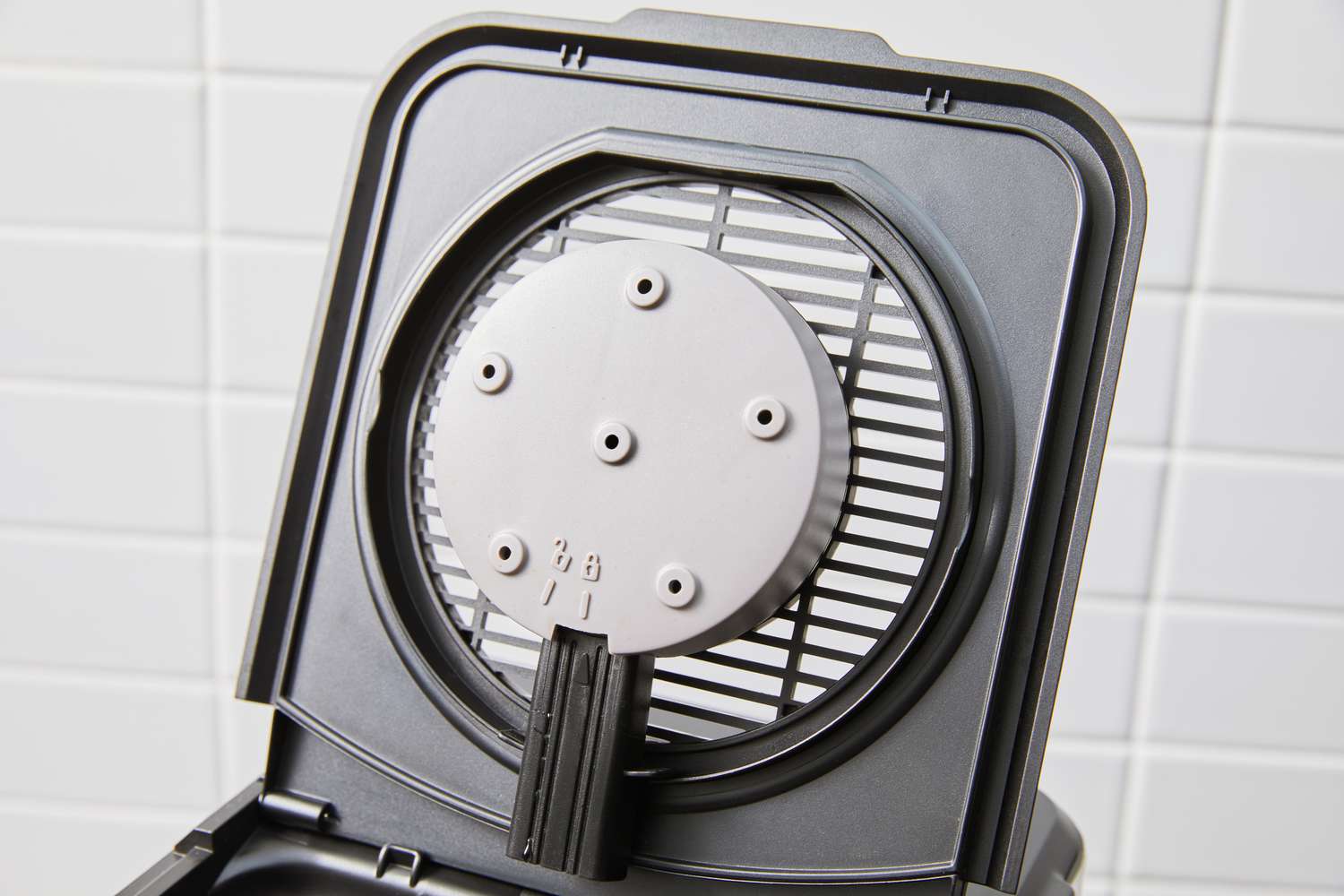 A close-up of the Oxo Brew 8-Cup Coffee Maker's lid