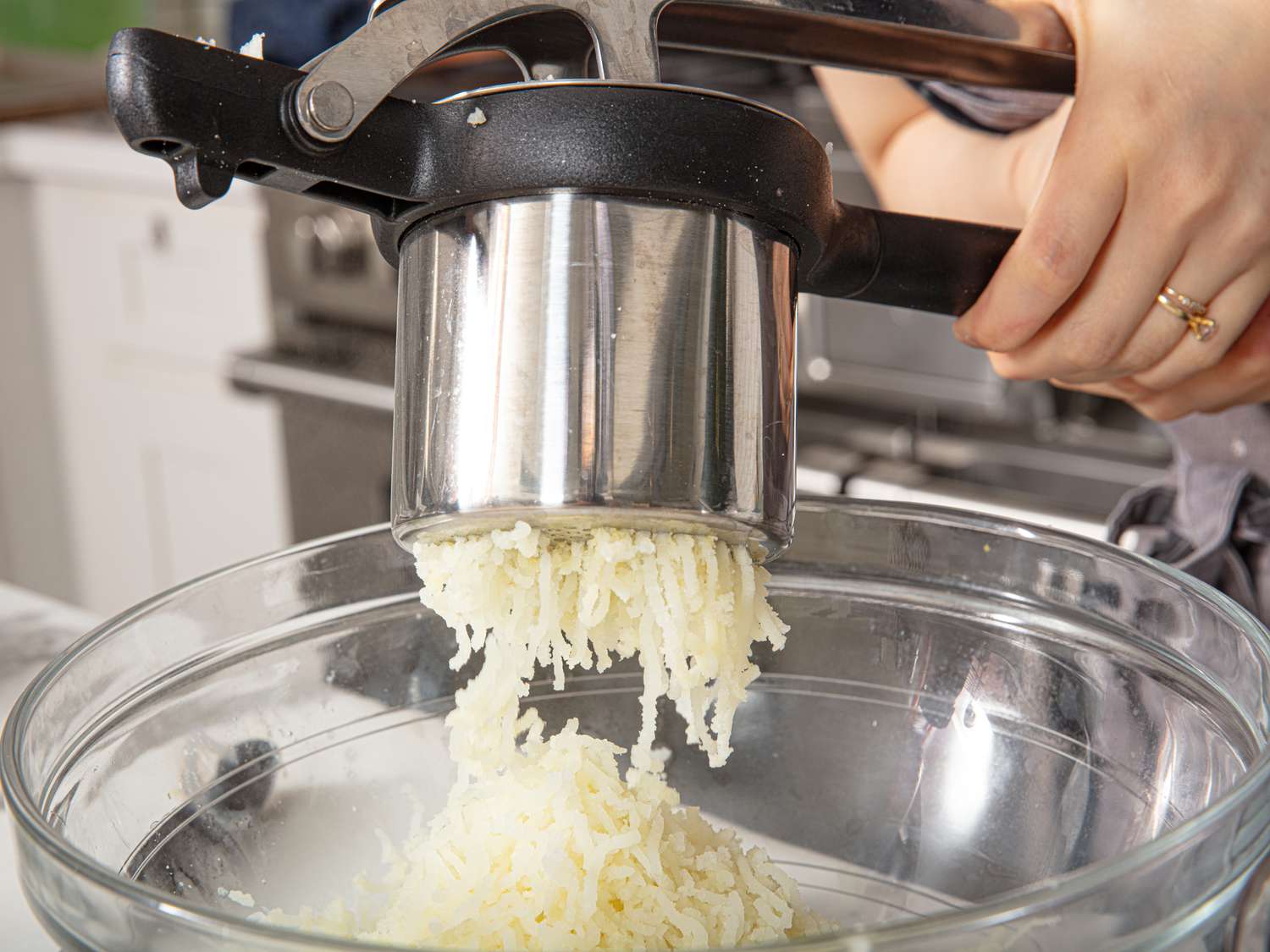 Side view of ricing potato