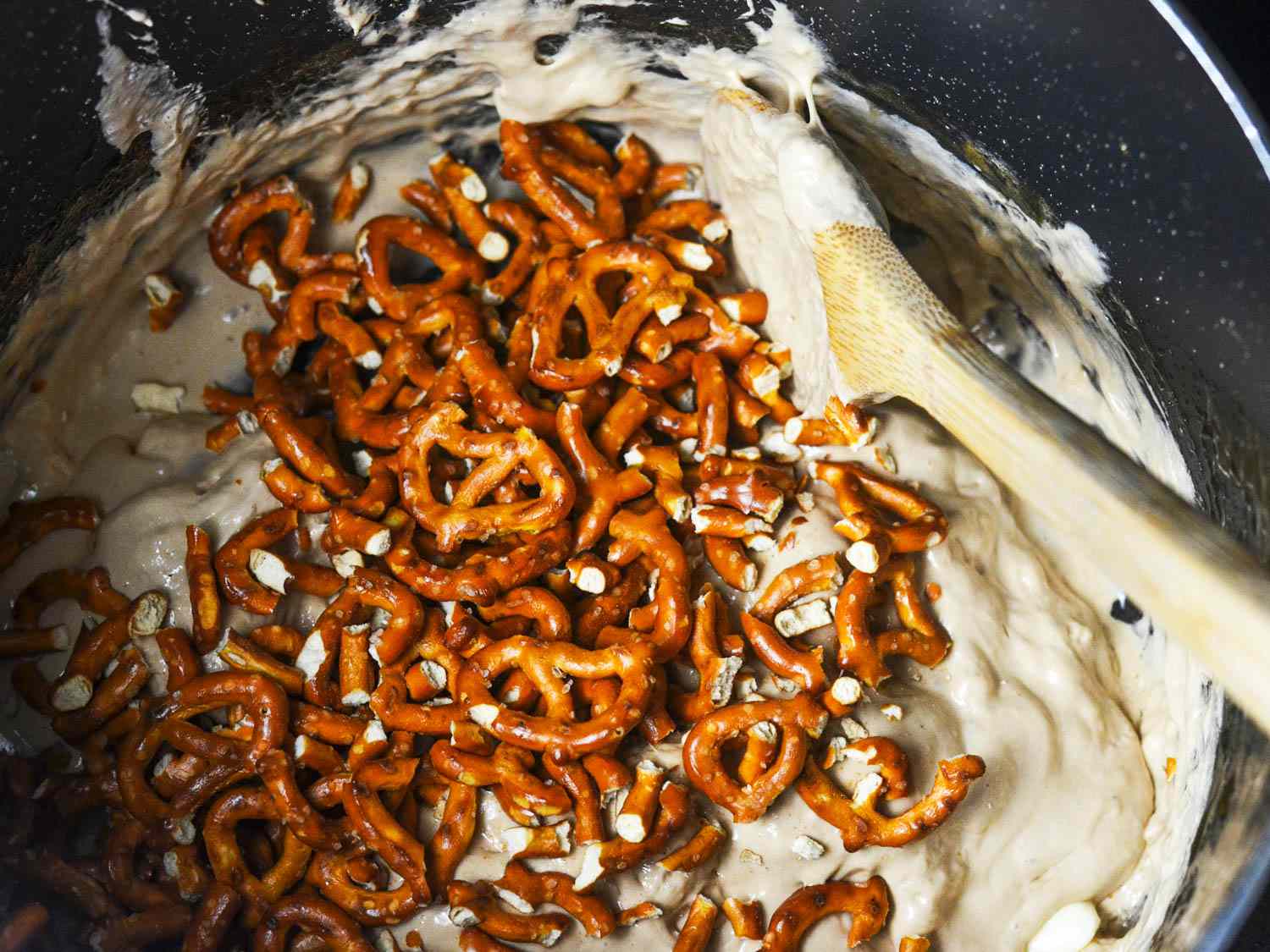 Crushed pretzels are folded into the warm marshmallow mixture.