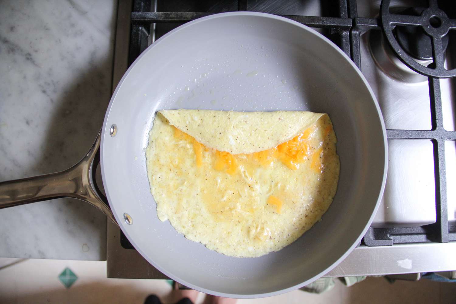 Food cooking in the Caraway Nonstick Ceramic Frying Pan