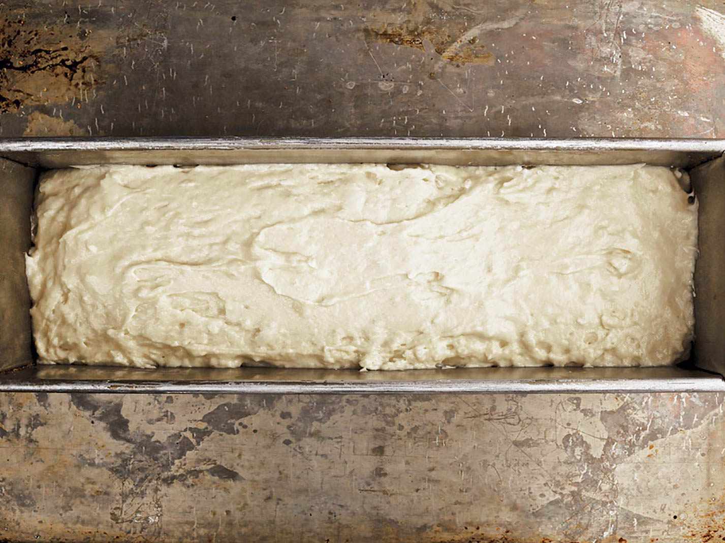 An overview photo of an unbaked loaf of bread.