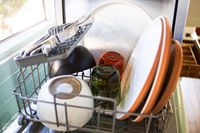 The Comfee countertop dishwasher filled with clean dishes.