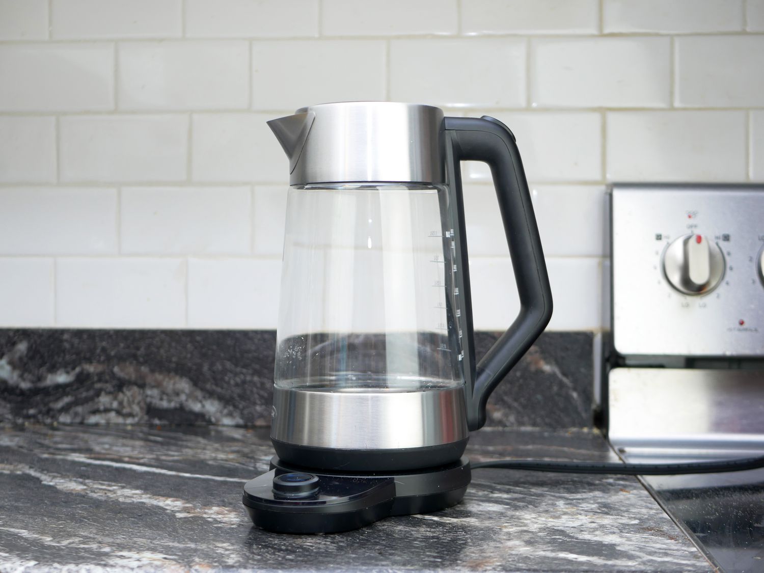 The OXO variable kettle on a dark gray kitchen countertop
