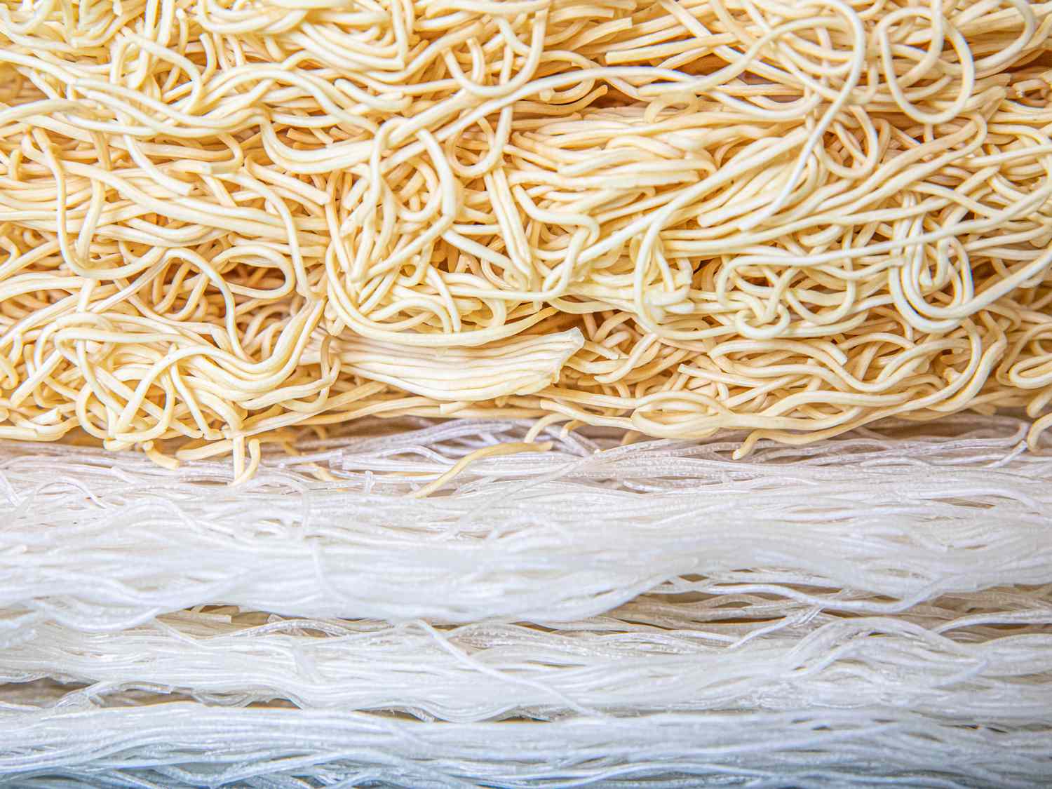 Two types of dry noodles stacked on top of each other