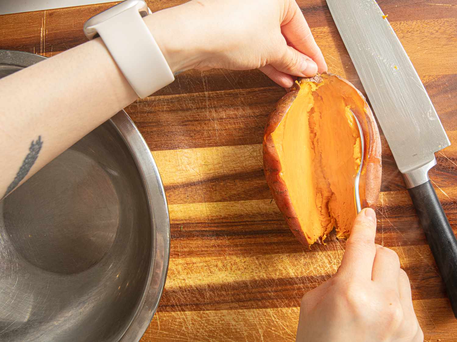 Scooping sweet potatoes