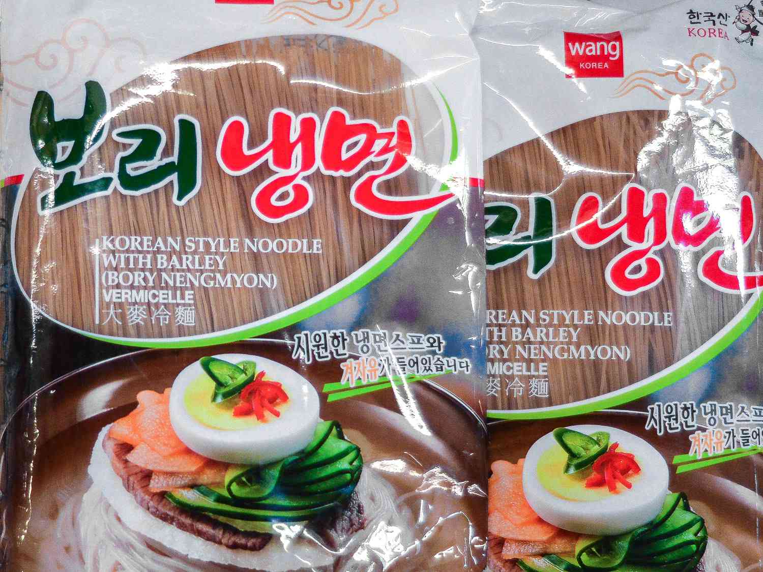Two packages of naenmyeon noodles.