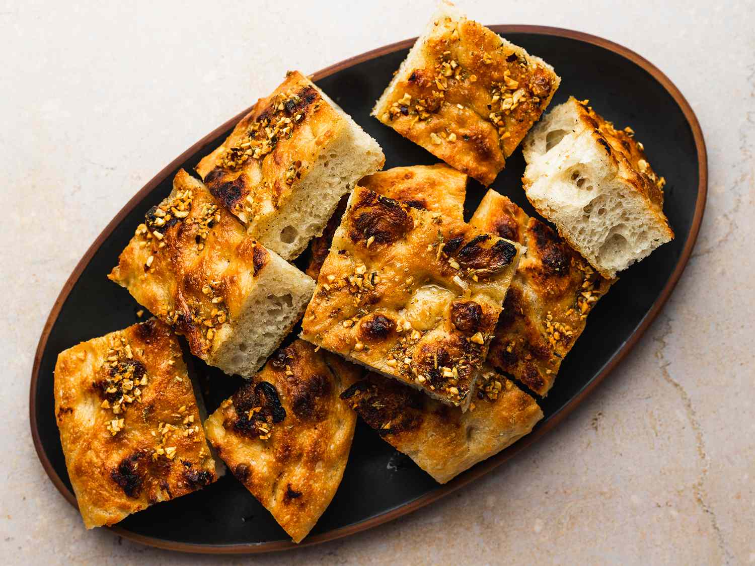 Roasted-Garlic Focaccia on an oval platter