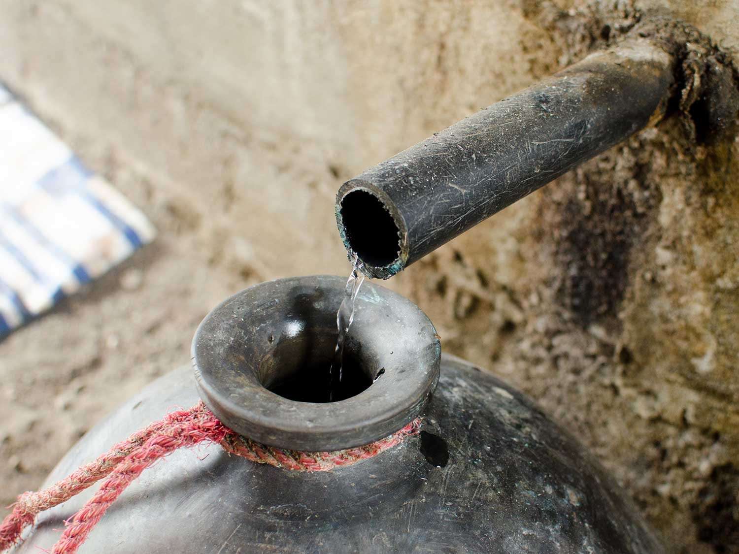 Mezcal drips from a still in Oaxaca.