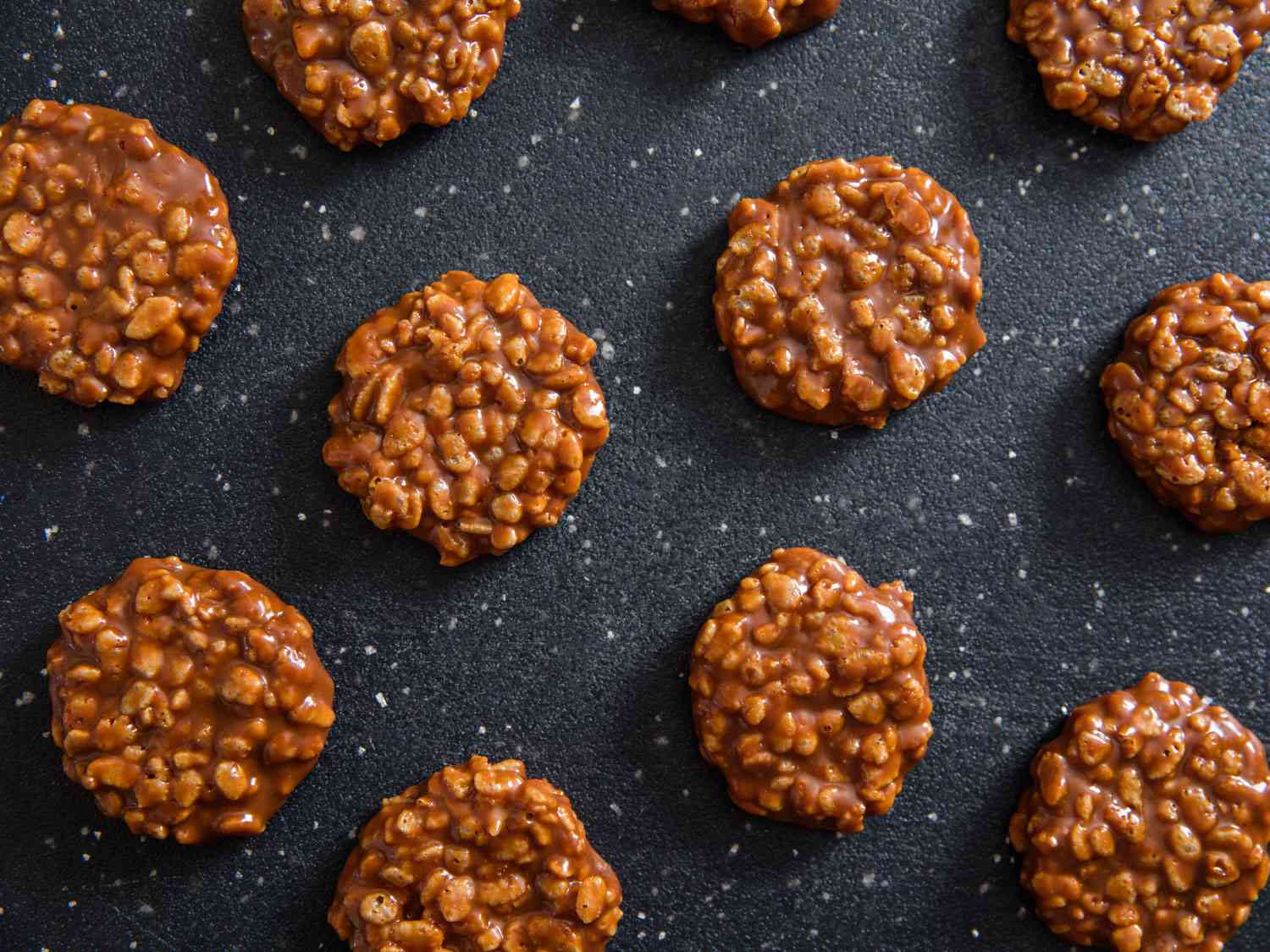 Overhead shot of Star Crunch cookies against dark starry night background.