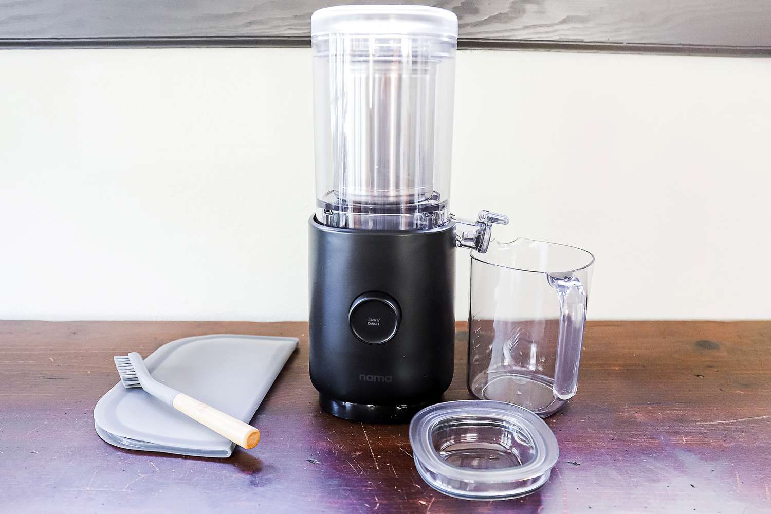 the nama nut milk maker on a wooden table