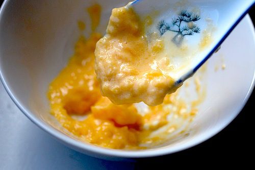 Broken cheese sauce made by melting cheese into milk.