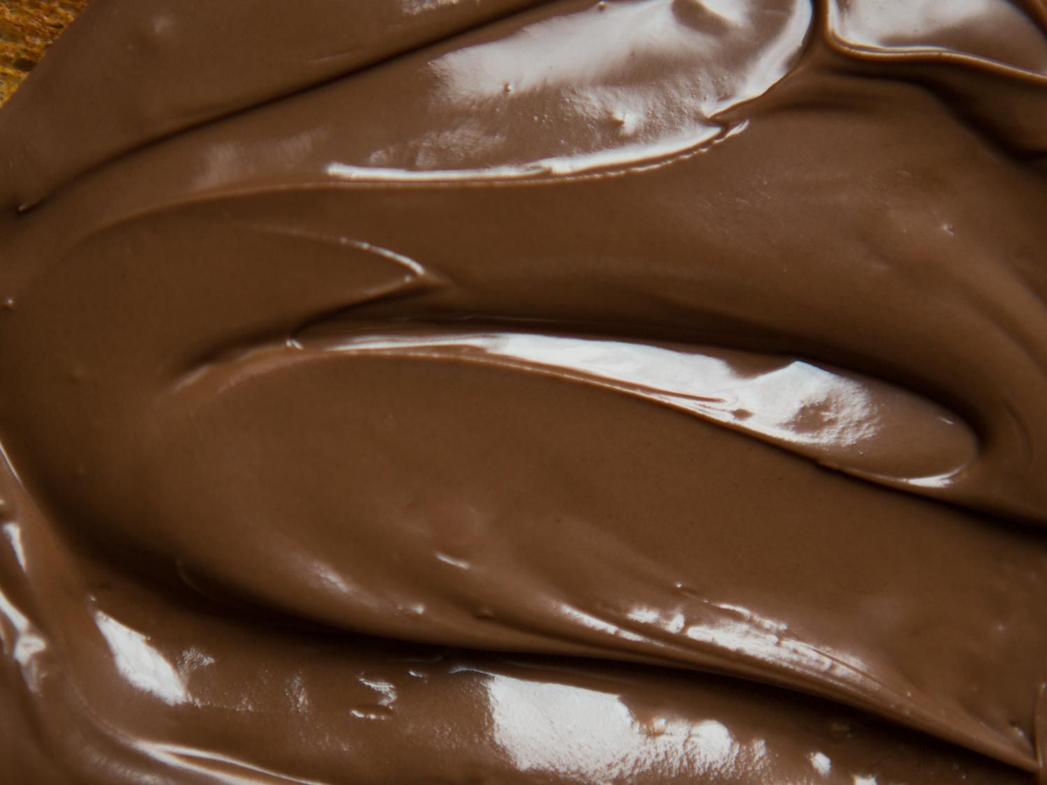 A close up look of a swirl of chocolate hazelnut spread.
