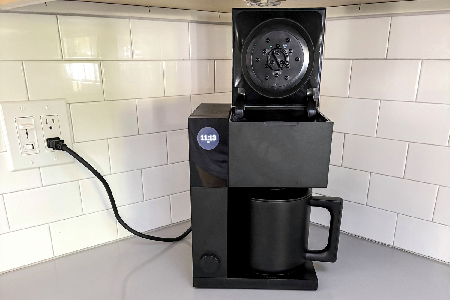 The Fellow Aiden with its water reservoir's lid open.