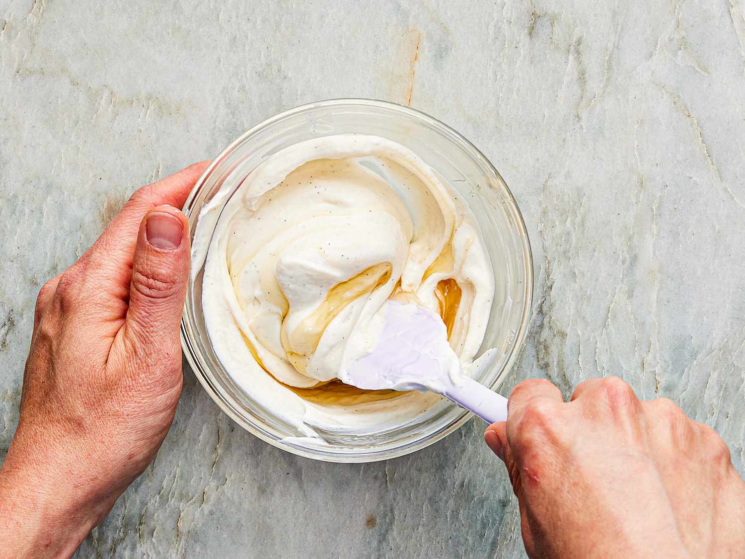 Overhead view of mixing yogurt topping for honey-butter toast