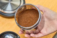 Coffee beans ground in the OXO Brew Conical Burr Coffee Grinder With Integrated Scale