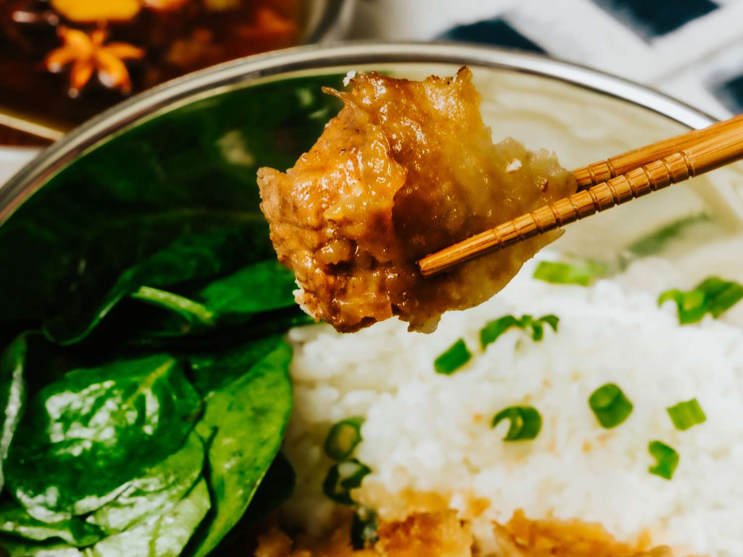 Side view of a bite of pork chop