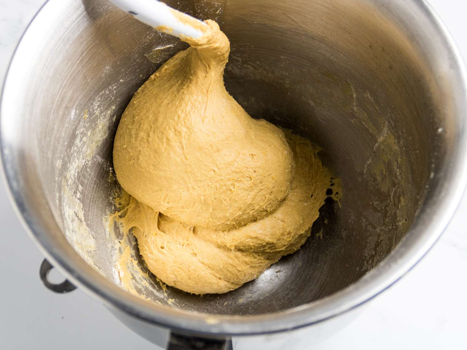 dough mixed fully in bowl in stand mixer 