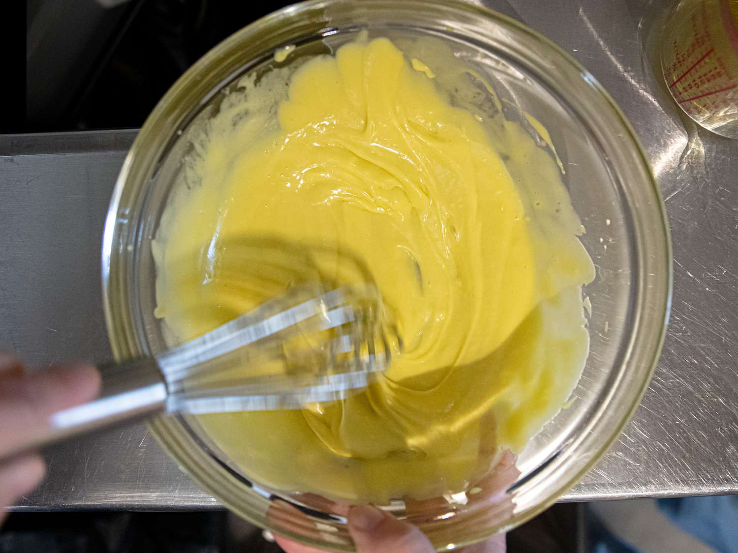 Overhead view of whisking