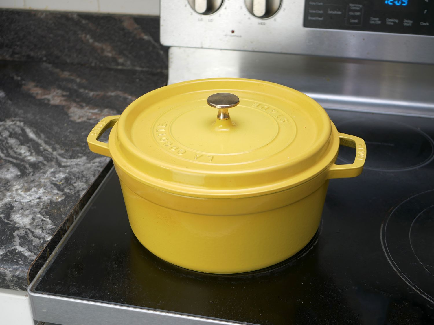 staub dutch oven on stove