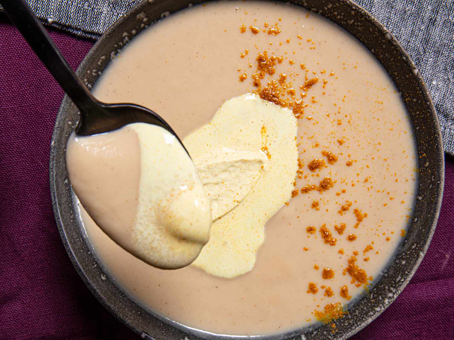 Overhead view of a spoonful of soup