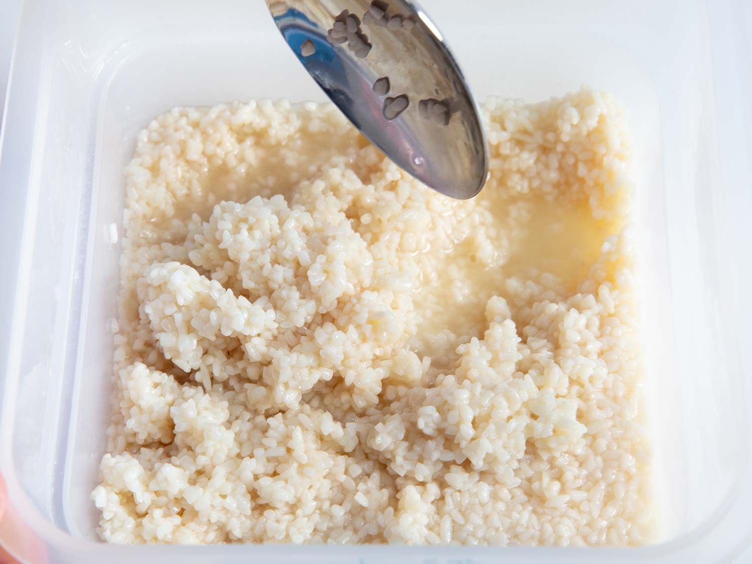 Stirring in-progress shio koji.