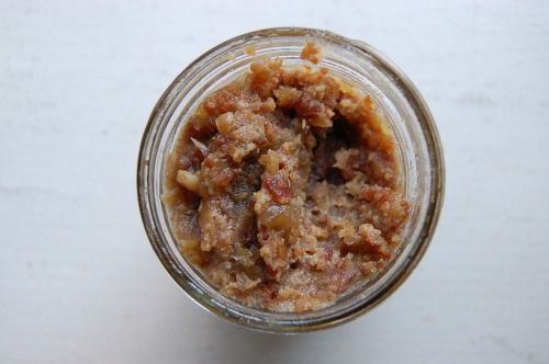 An overhead view of bacon bourbon jam in a glass jar.