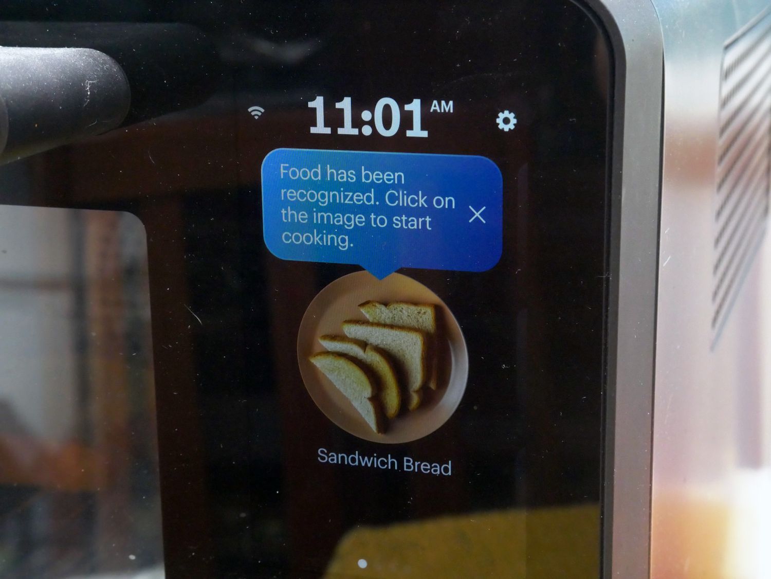 a closeup of the digital screen on the anova oven showing recognition of the bread inside