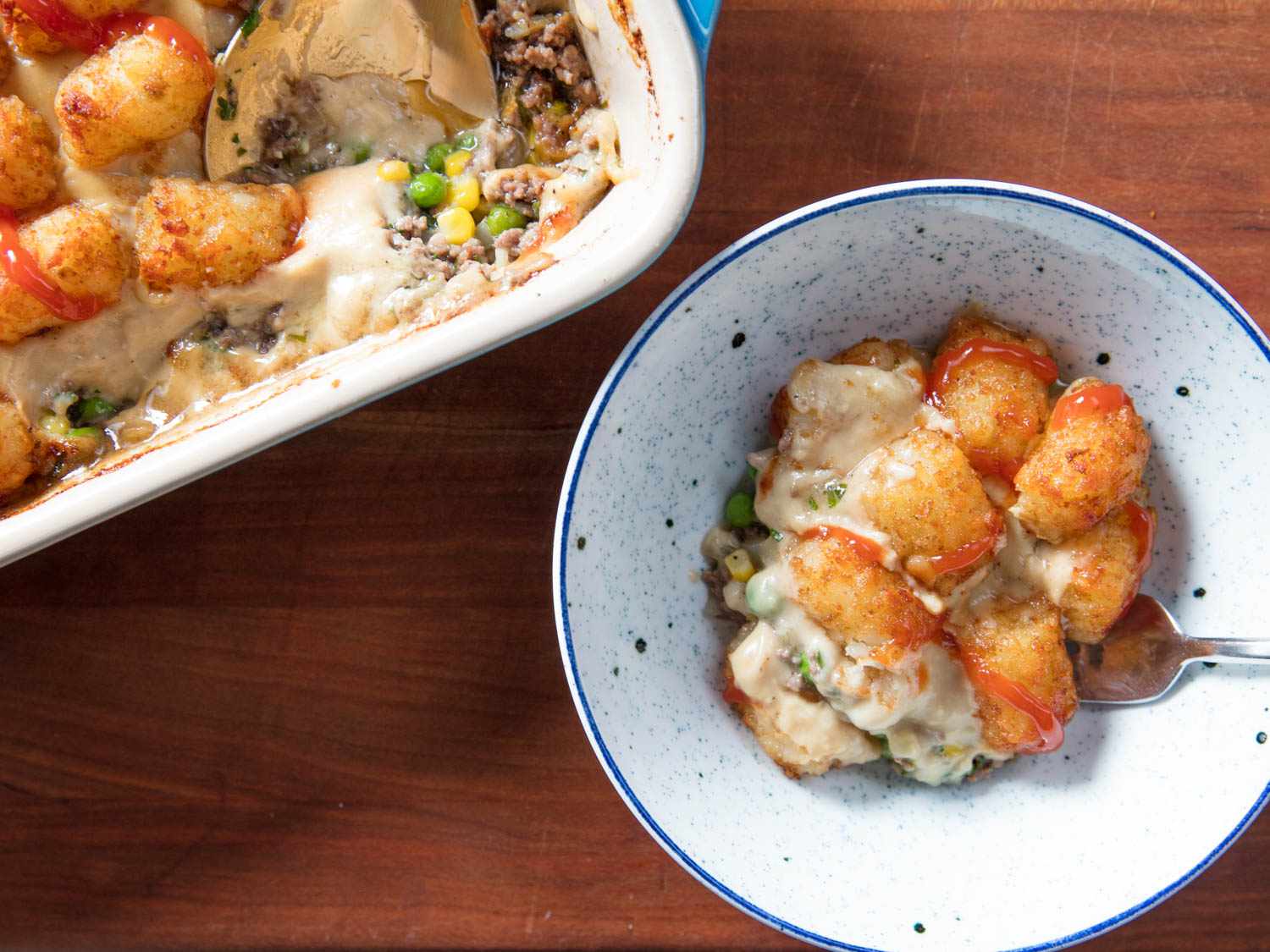 One portion of tater tot hotdish served in a bowl.
