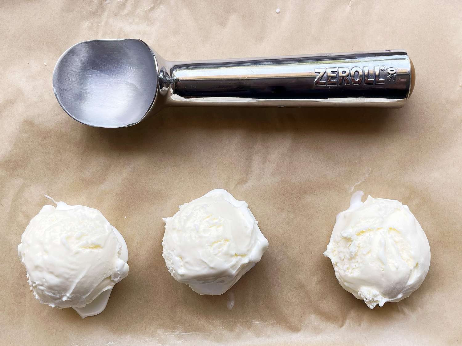 zeroll ice cream scoop with three scoops of vanilla