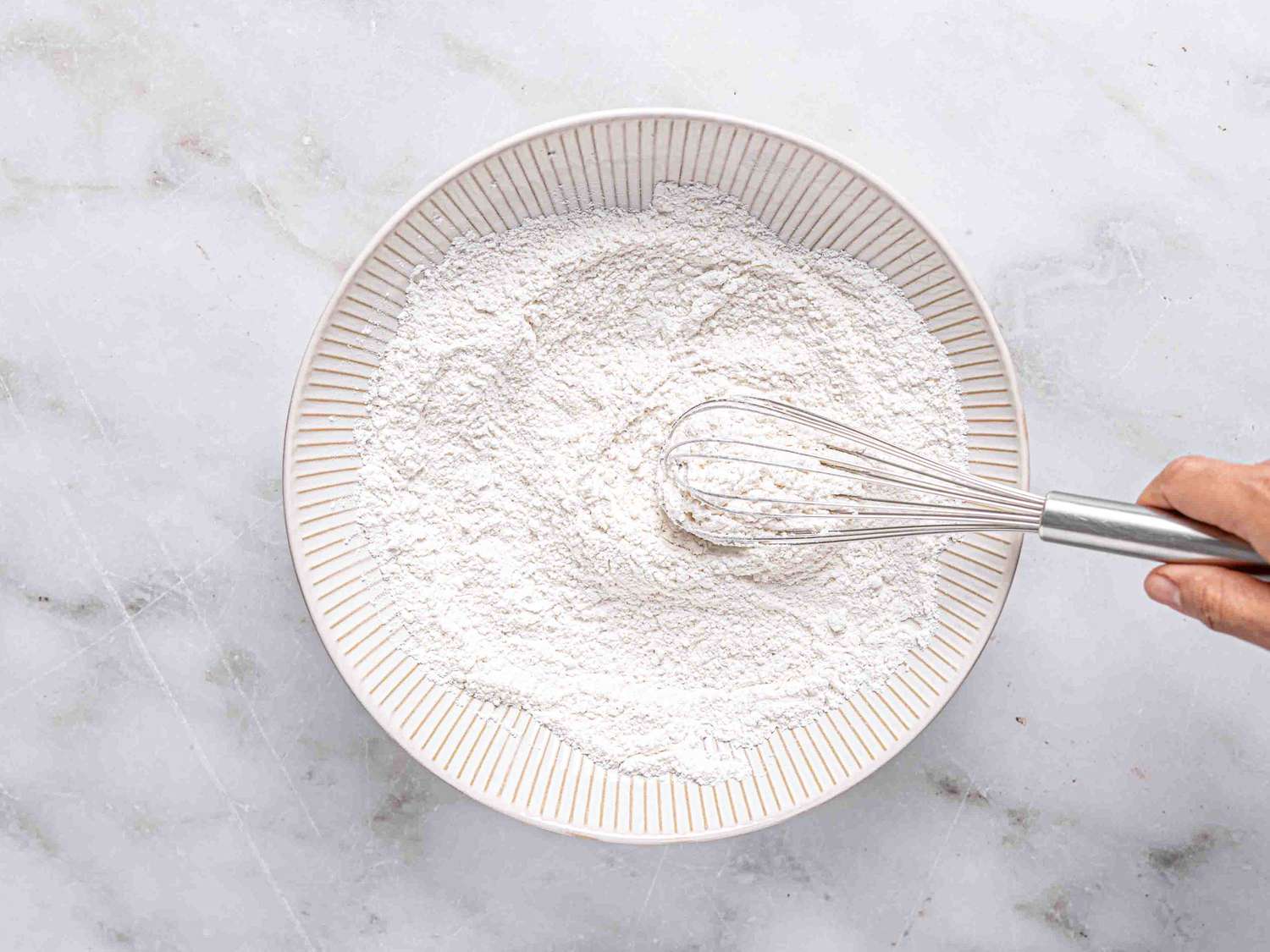 Overhead view of mixing dry ingredients together 