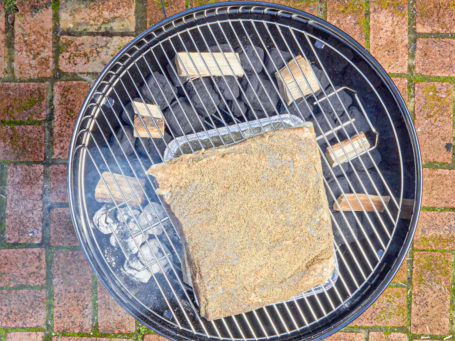 Overhead view of brisket directly on grate