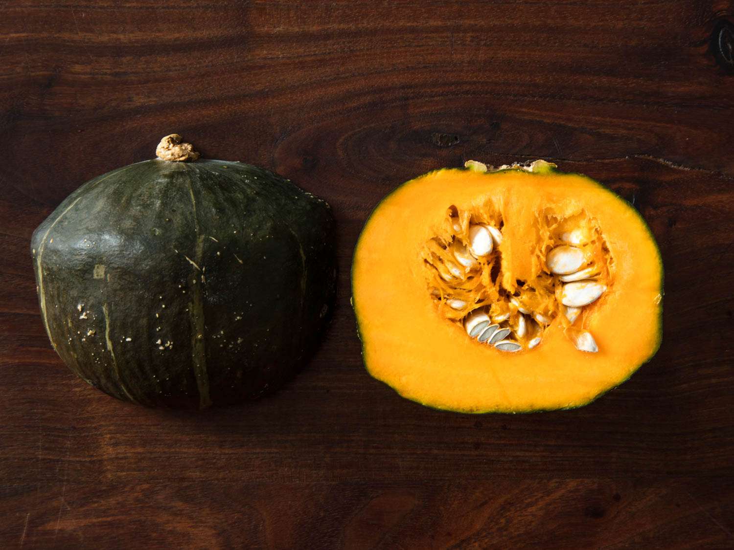 Buttercup squash halved, displayed cut side down and cut side up
