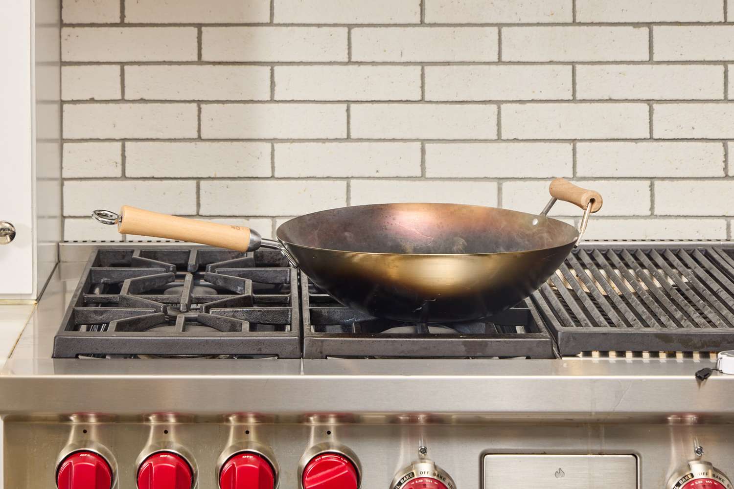 The Joyce Chen Carbon Steel Wok on a stovetop