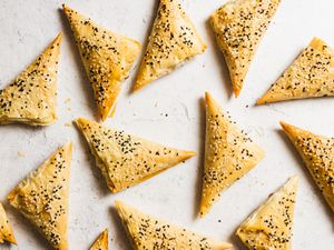 an overhead shot of boreks on a marble surface