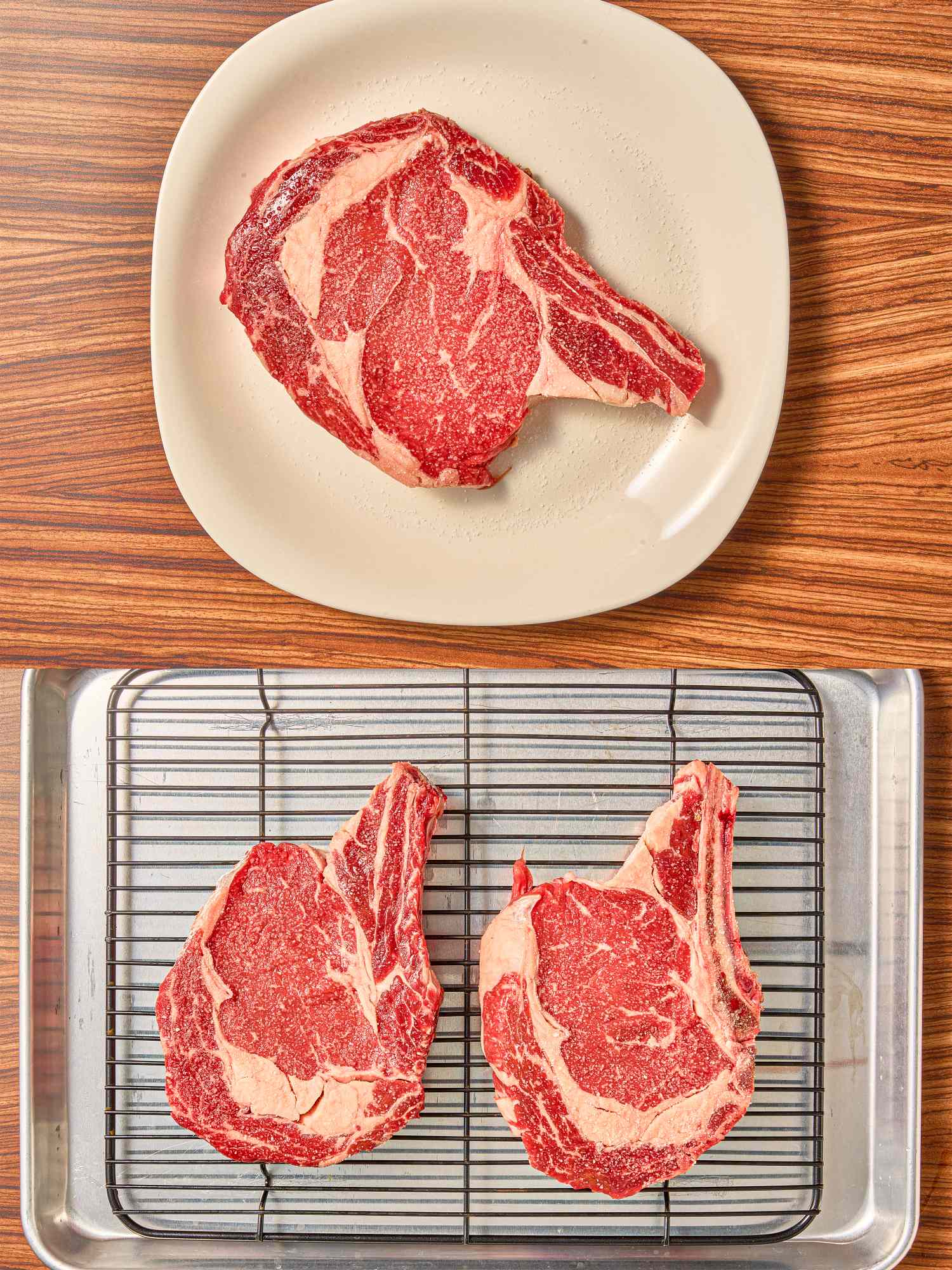 A raw steak on a plate and two raw steaks on a rack in a tray displayed on a wooden surface