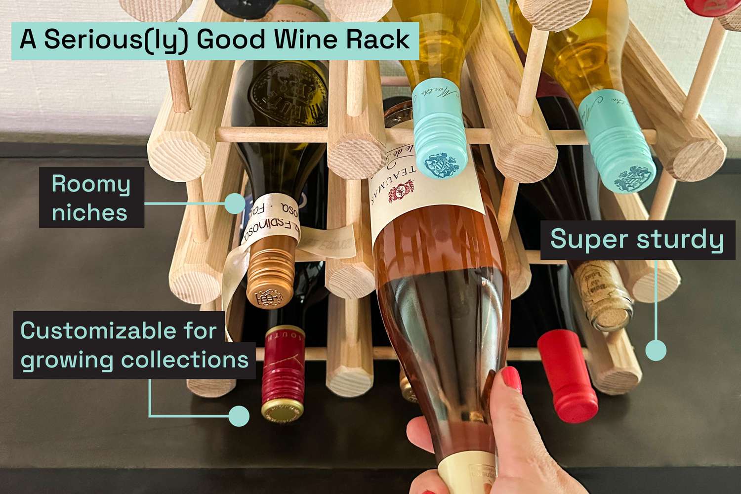A wooden wine rack filled with bottles.