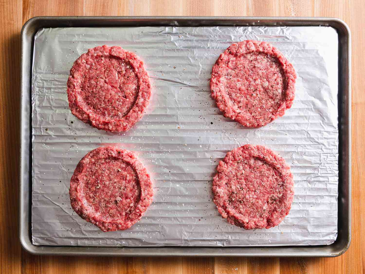 burger patties formed into discs with indents 