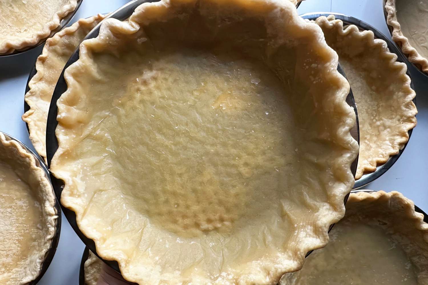 Imprinted dots on a poorly baked pie shell.
