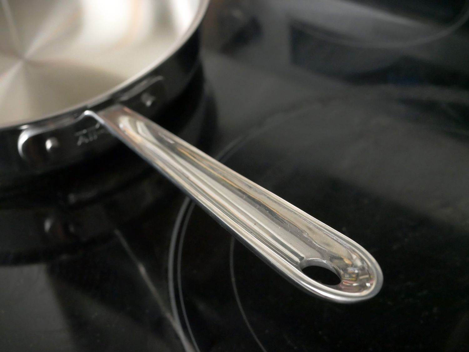 the handle of the all-clad saute pan
