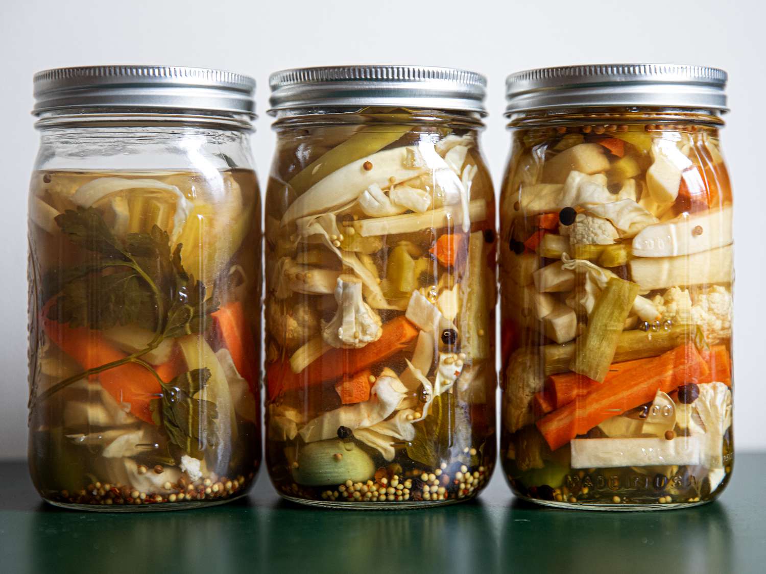Three finished tourshi jars